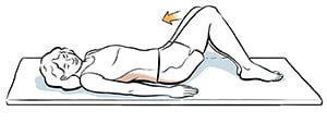 Woman lying on back with legs rotated to one side and head rotated to opposite side. 
